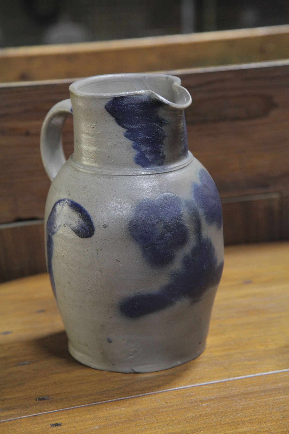 Appraisal: BATTER PITCHER American late th century Grey bulbous form stoneware