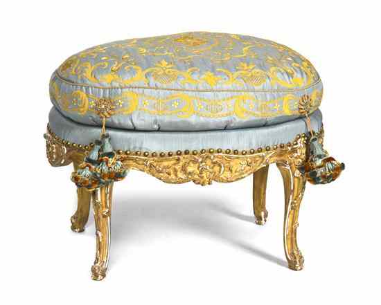 Appraisal: A Louis XV Style Giltwood Tabouret having an oval upholstered