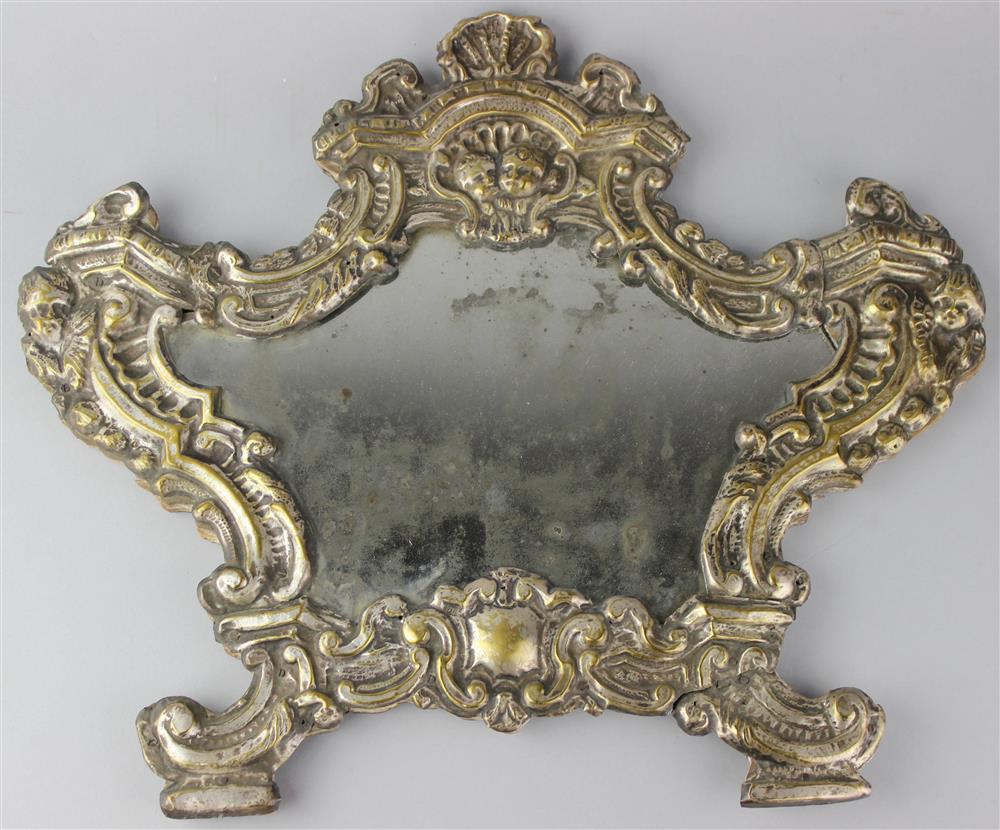 Appraisal: CONTINENTAL BAROQUE REPOUSSE SILVERED-BRASS MIRROR late th Century with central