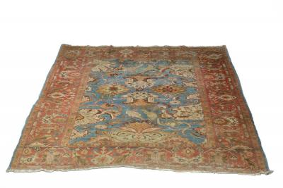 Appraisal: An Ushak Persian rug with field of birds and stylised