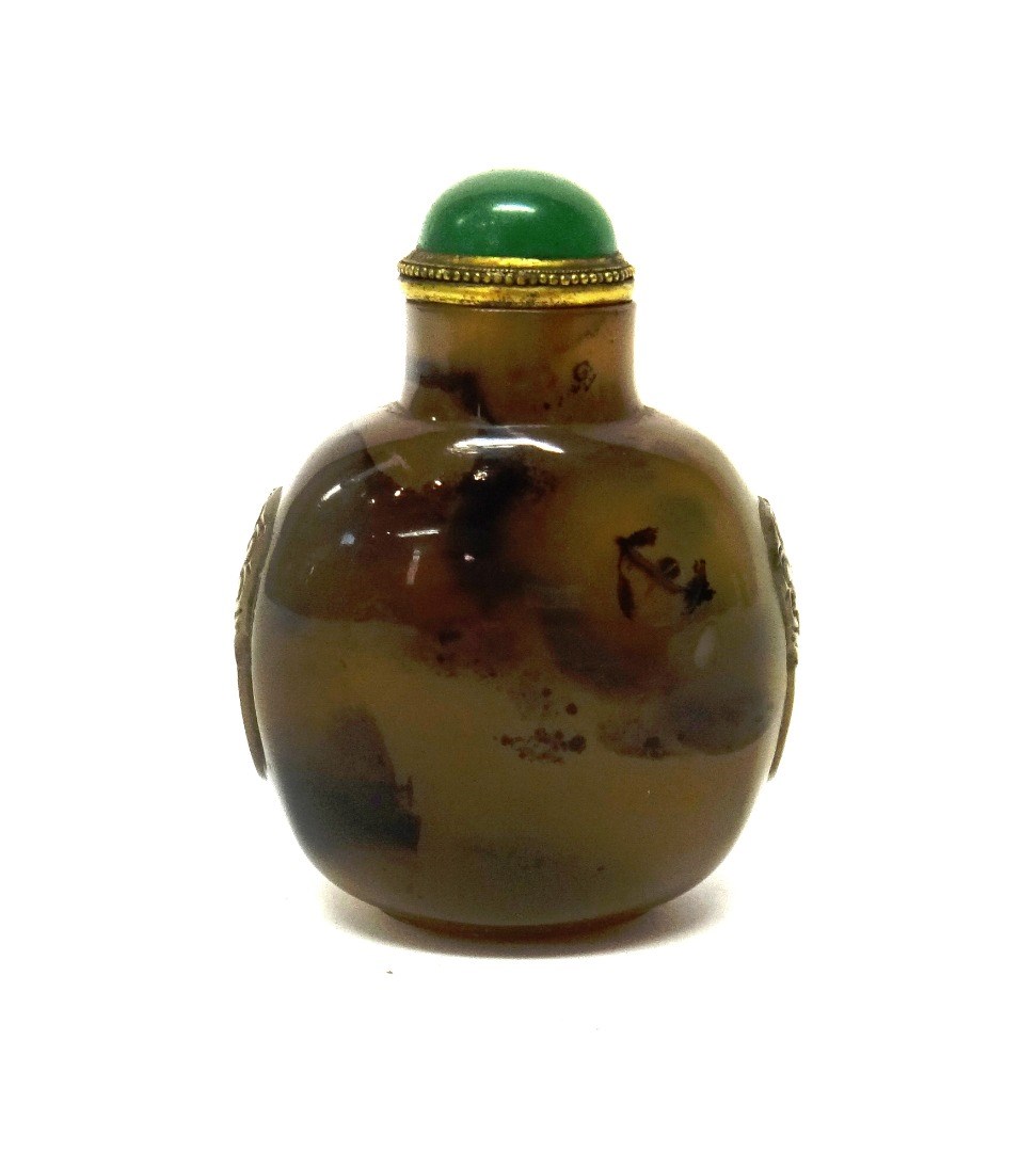 Appraisal: A chalcedony snuff bottle th th with dark brown inclusions