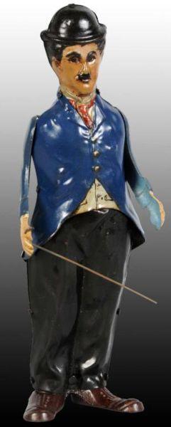 Appraisal: Tin Charlie Chaplin Walking Wind-Up Toy Description German Working Lithographed