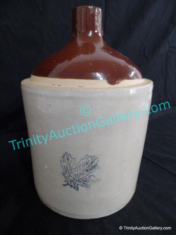 Appraisal: Western Stoneware Whiskey Jug Crock Utility Old stoneware jug with