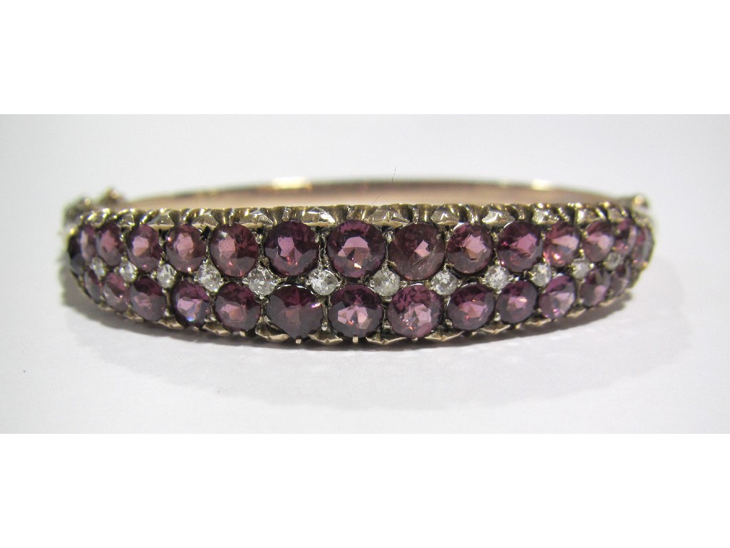 Appraisal: A Victorian rose gold amethyst and diamond set bangle with