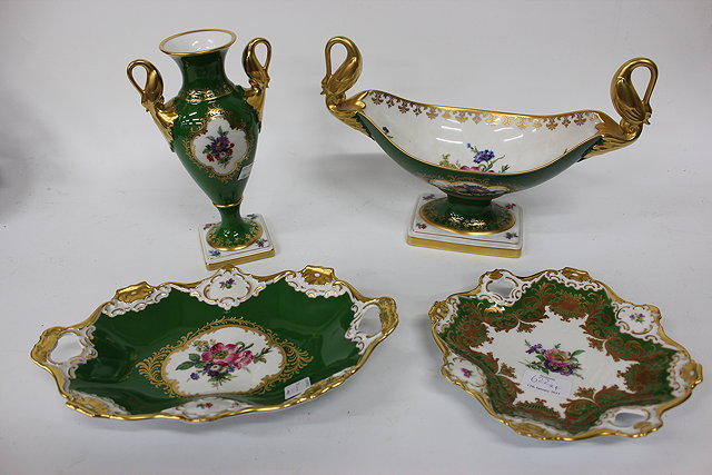 Appraisal: A GERMAN KAISER PORCELAIN FLOWER DECORATED FOOTED DISH with swan