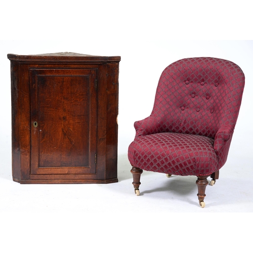 Appraisal: A Victorian nursing chair on turned walnut legs and a