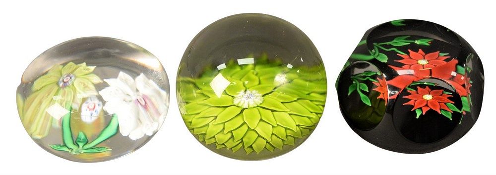 Appraisal: Three Saint Louis Glass Paperweights having floral interiors each signed