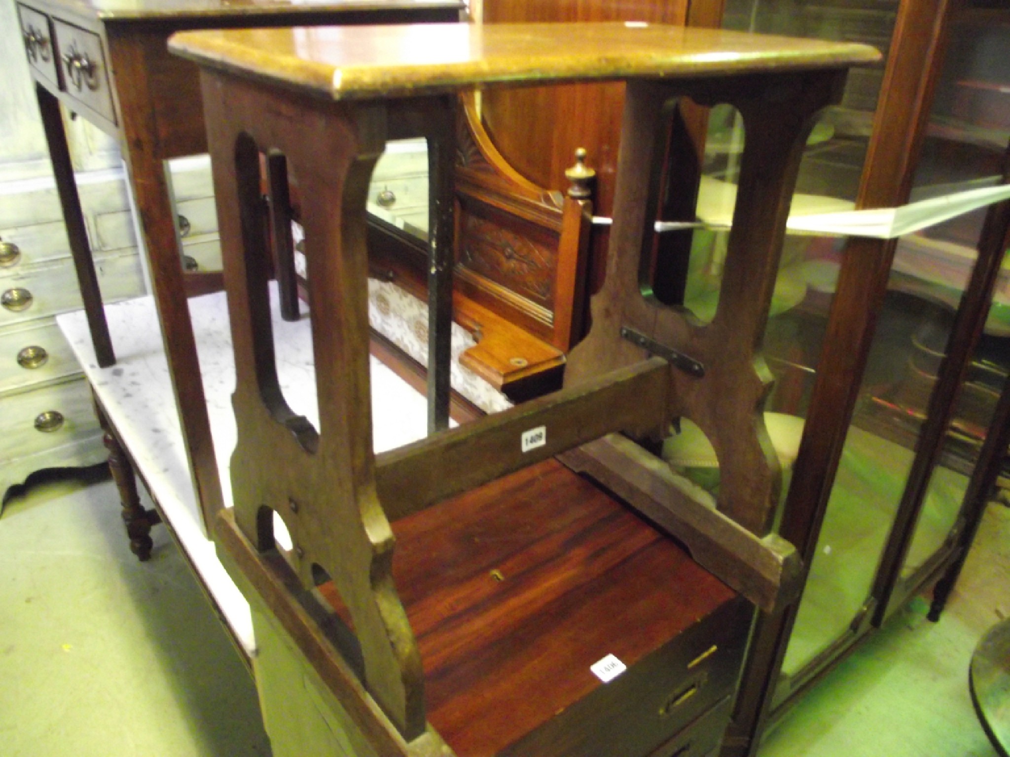 Appraisal: A vintage oak organ stool the rectangular solid seat raised