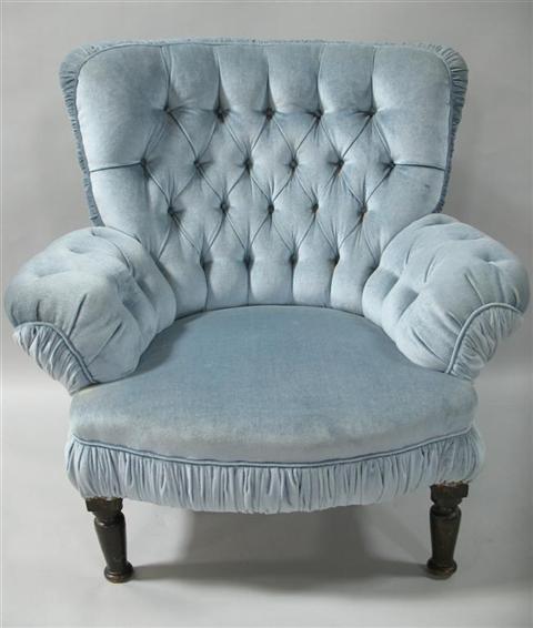 Appraisal: VICTORIAN BLUE BUTTON TUFTED ARMCHAIR The curved back with button-tufting