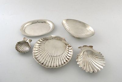 Appraisal: An American silver shell dish on two ball feet by