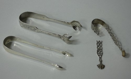 Appraisal: A pair of Victorian silver sugar nips H H London