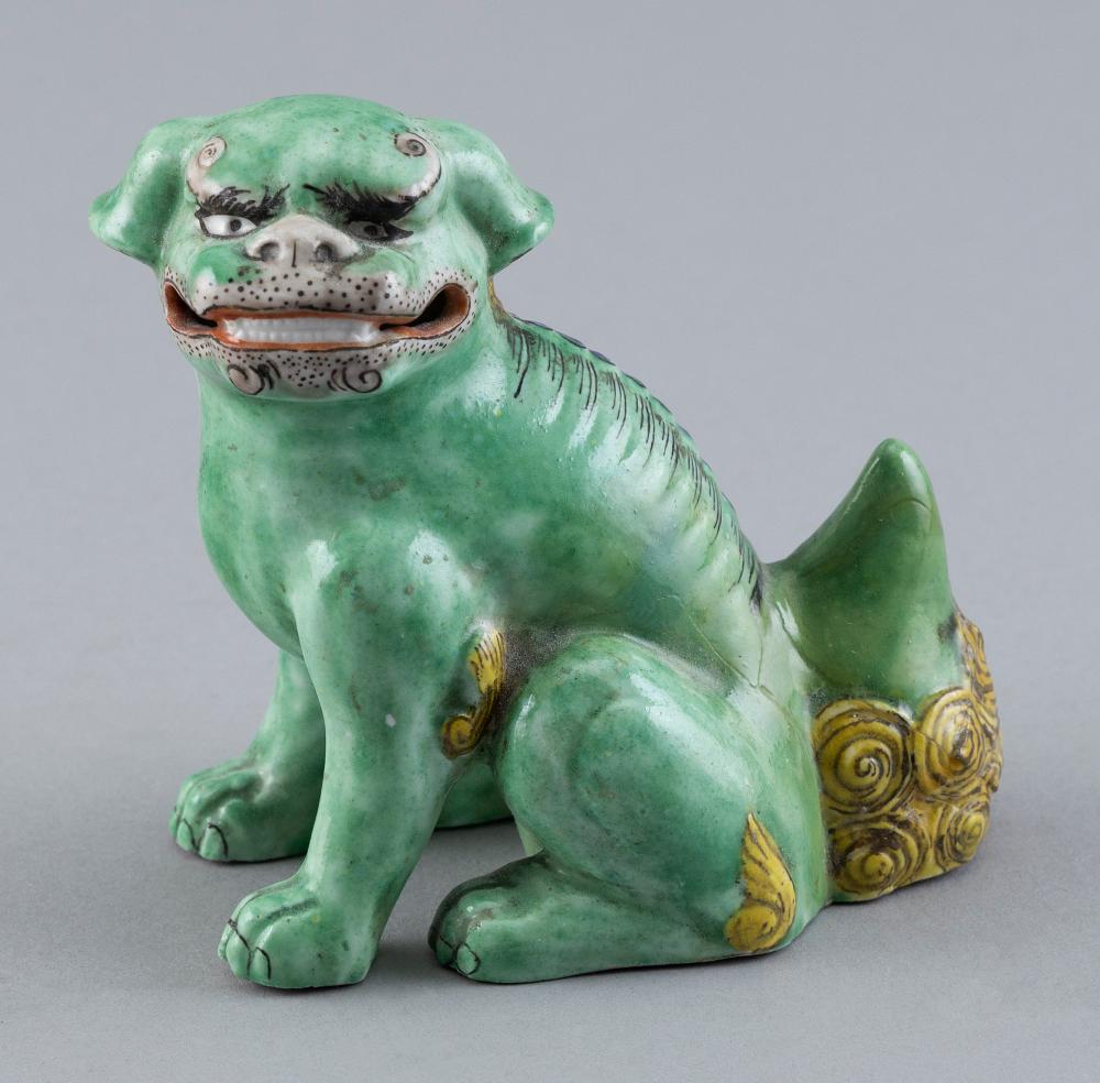 Appraisal: CHINESE GREEN GLAZE PORCELAIN FIGURE OF A FU DOG TH