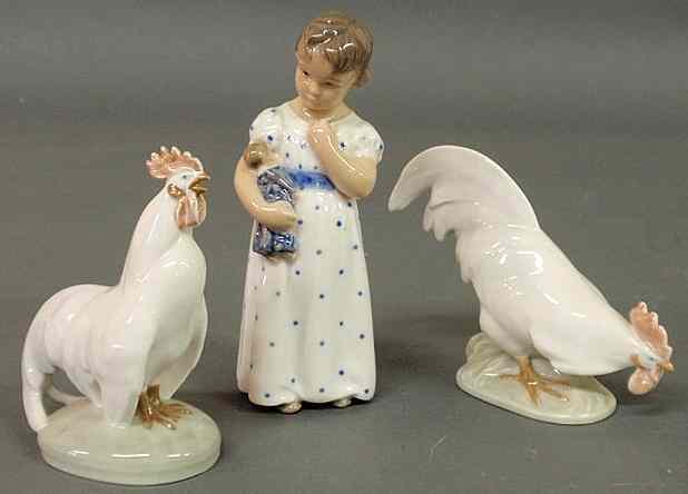 Appraisal: Three Royal Copenhagen figures- girl with doll h and two