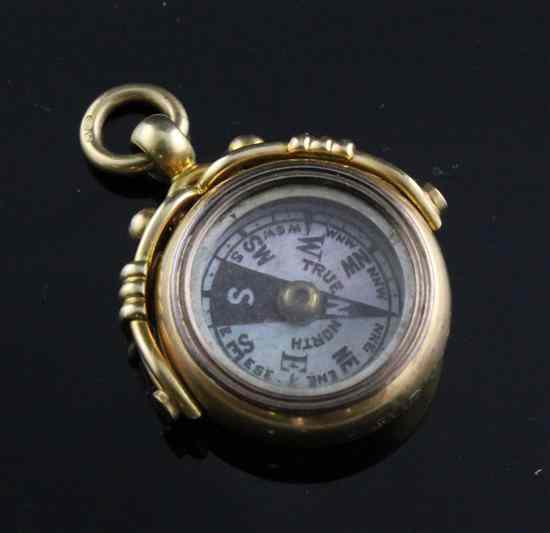 Appraisal: An ct gold swivel fob inset with a compass in