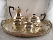 Appraisal: A four piece silver plated half ribbed oval tea and