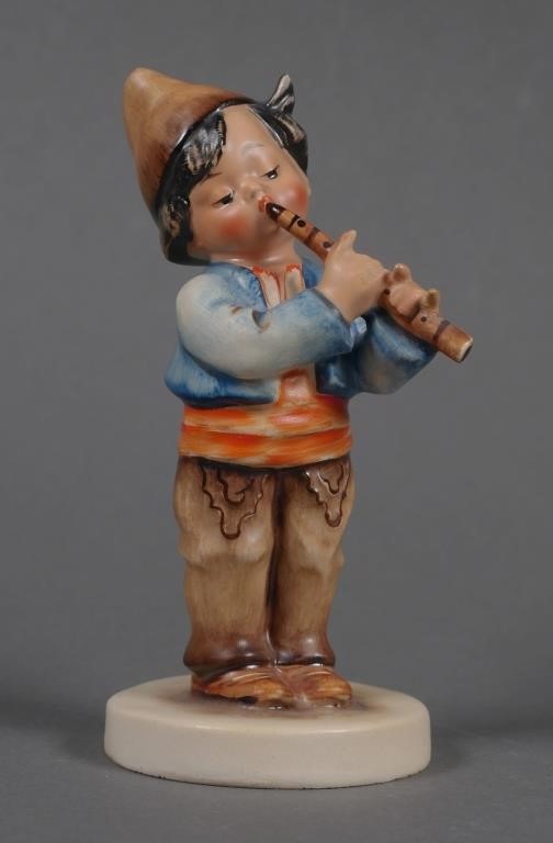 Appraisal: International Hummel Bulgarian boy playing horn This piece bears M