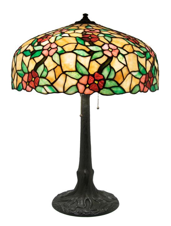 Appraisal: An American Leaded Glass and Cast Bronze Table Lamp Chicago