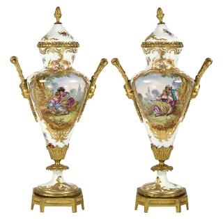 Appraisal: Pair of Sevres ormolu mounted porcelain covered urns Pair of