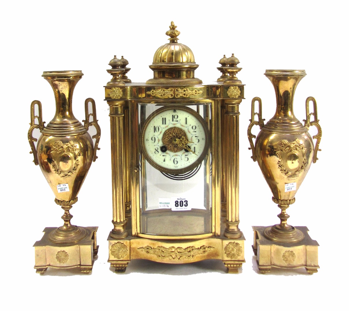 Appraisal: A French gilt brass four-glass mantel clock garniture late th