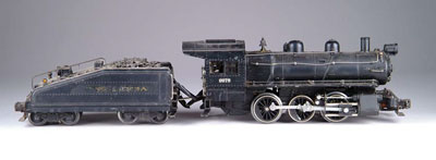 Appraisal: LIONEL LOCOMOTIVE TENDER Diecast locomotive and B bell ringing tender