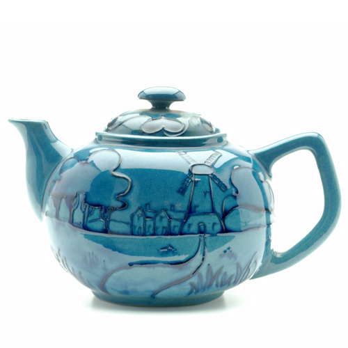 Appraisal: WELLER RHEAD FAIENCE Teapot squeezebag-decorated with a panoramic village landscape