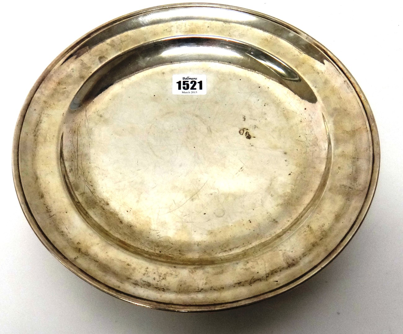 Appraisal: A European circular silver shallow dish detailed underneath R L