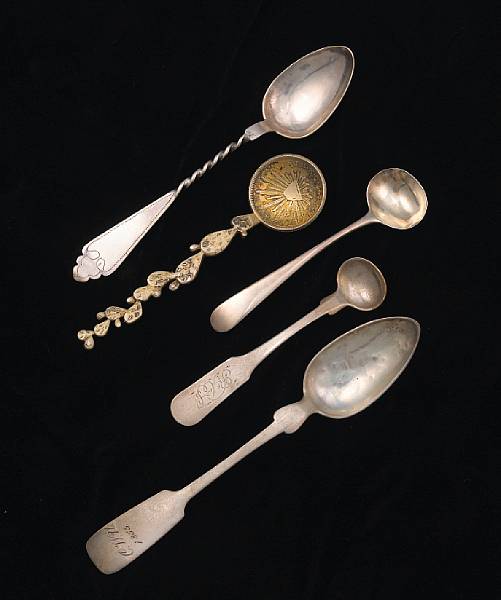 Appraisal: A group of silver flatware Comprising novelty sterling spoon with