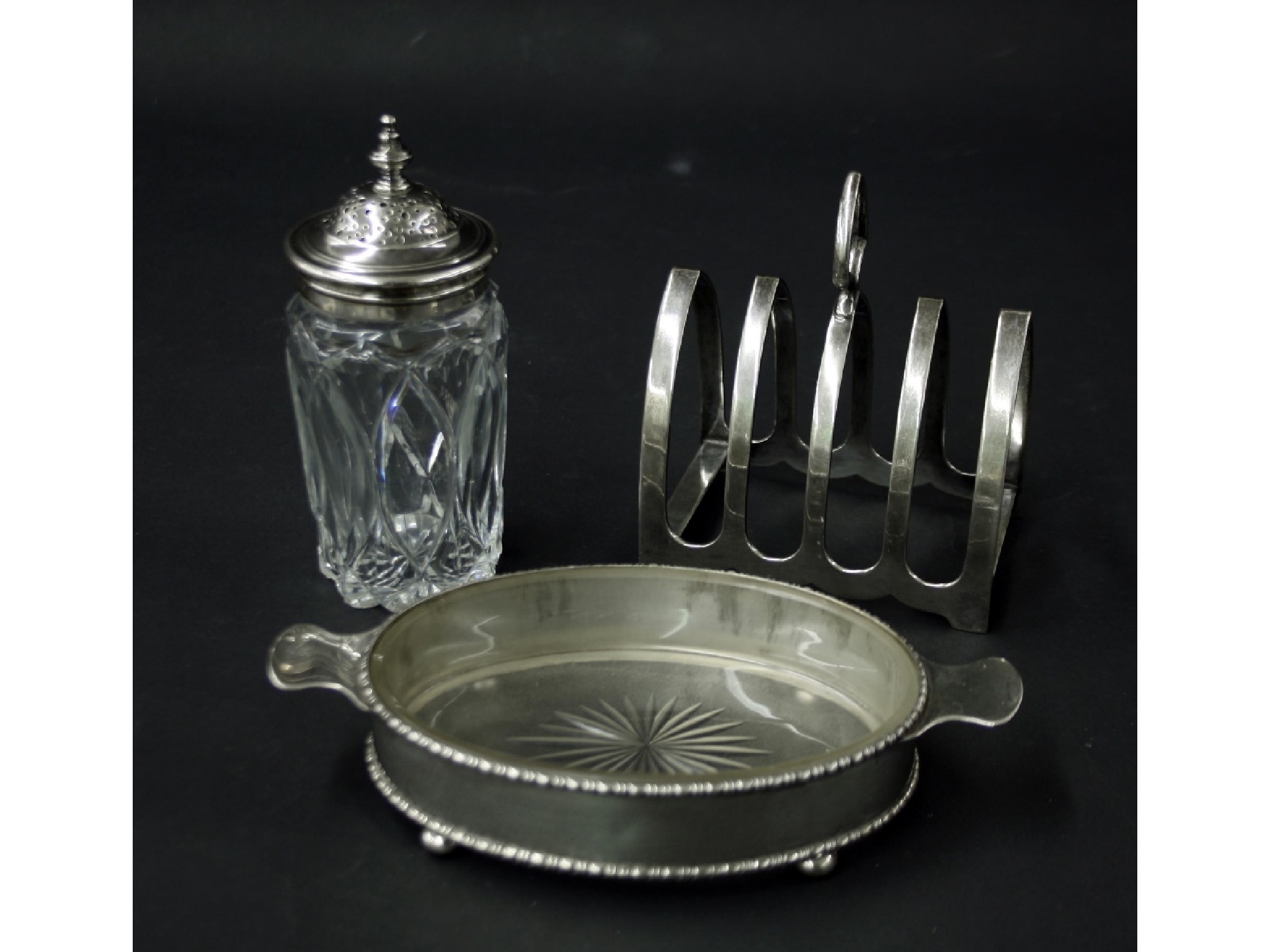 Appraisal: Lancet design s silver four division toast rack maker Viners