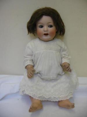 Appraisal: A Heubach Koppelsdorf bisque head doll the blue sleeping eyes