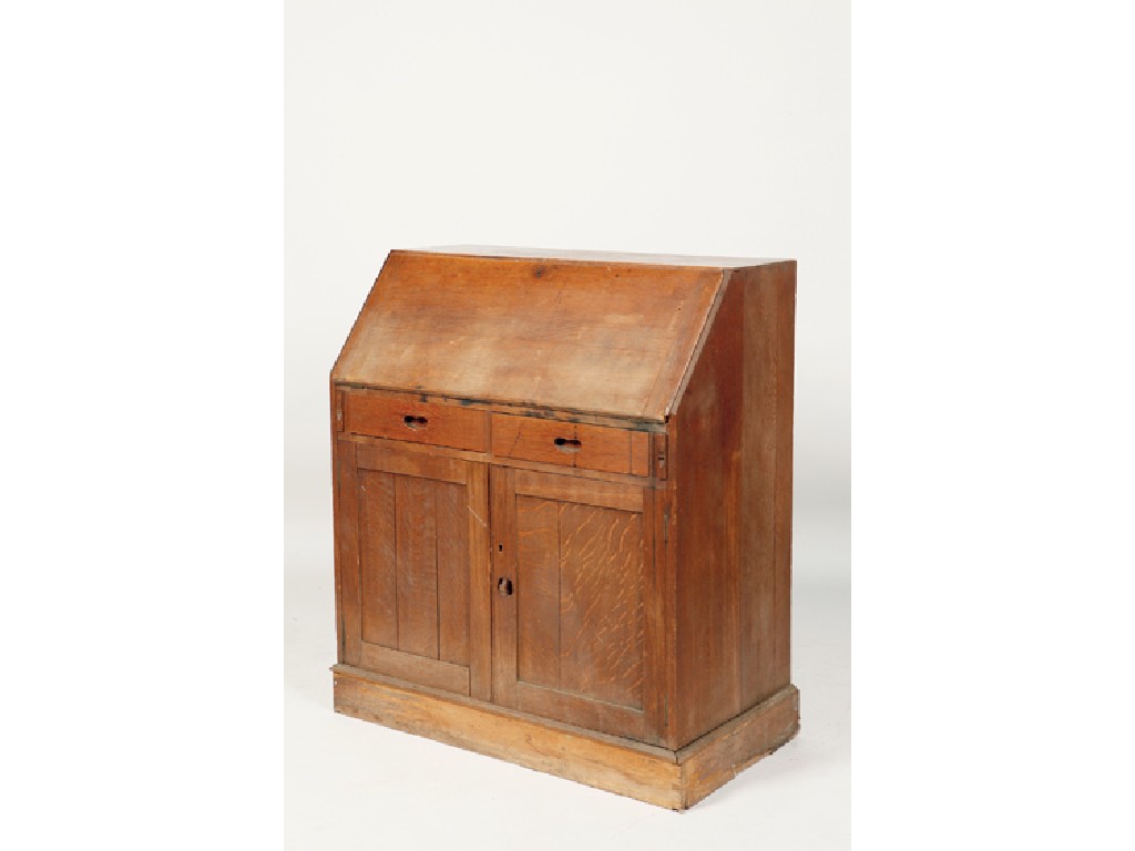 Appraisal: HEALS A LIGHT OAK BUREAU with a sloping fall enclosing