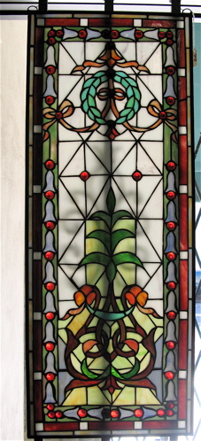 Appraisal: PAIR STAINED AND LEADED GLASS WINDOW PANELS in the Art