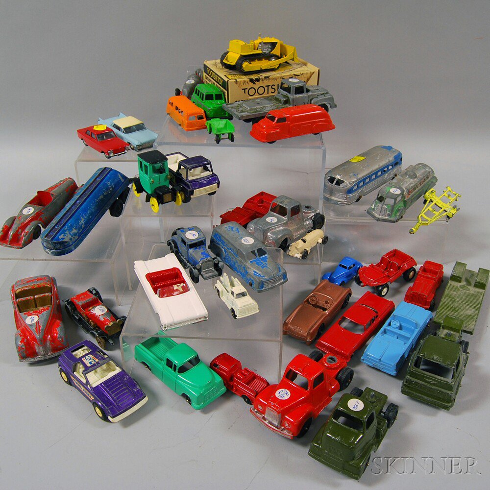 Appraisal: Approximately Twenty-eight Tootsietoy Painted Die-cast Metal Vehicles including four convertibles