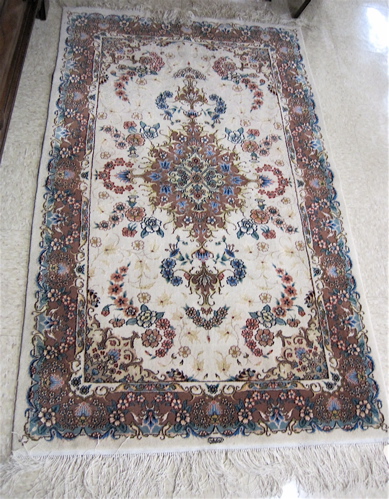 Appraisal: HAND KNOTTED ORIENTAL SILK AND WOOL AREA RUG flora and