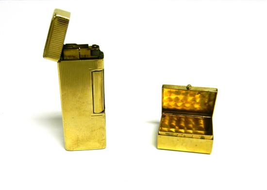 Appraisal: c s Dunhill gold plated cigarette lighter K gold outer