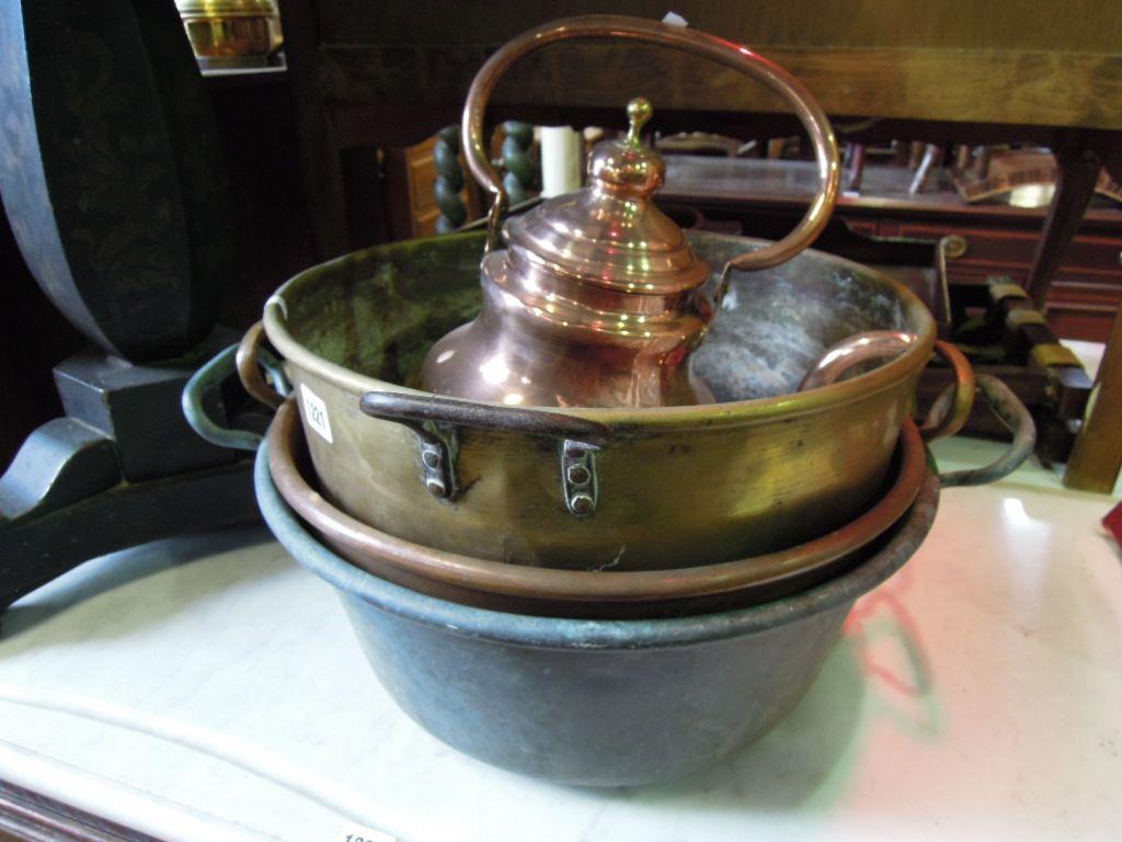 Appraisal: Three th century brass and copper preserving pans together with