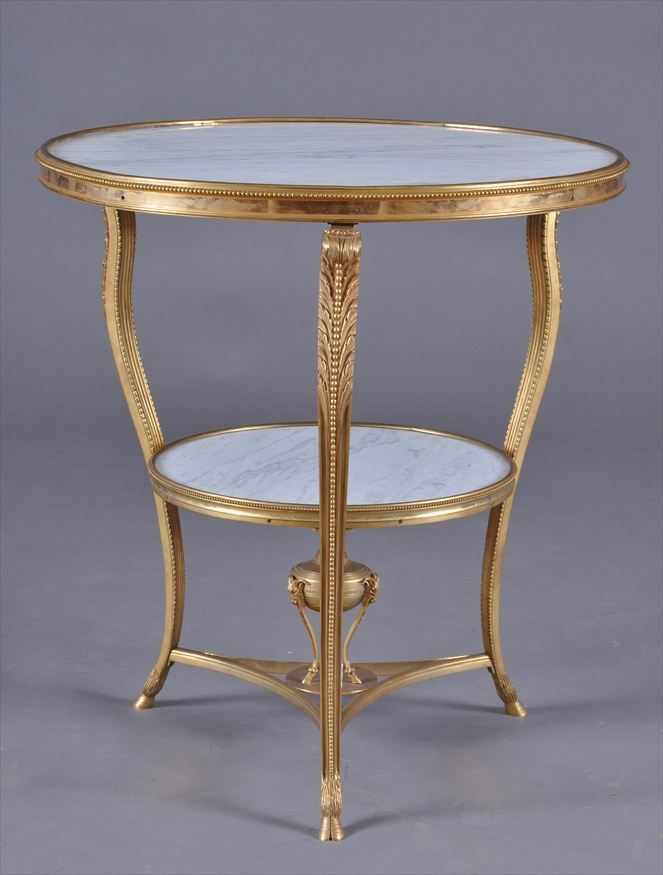 Appraisal: LOUIS XVI STYLE GILT-BRONZE GU RIDON Fitted with two Carrara