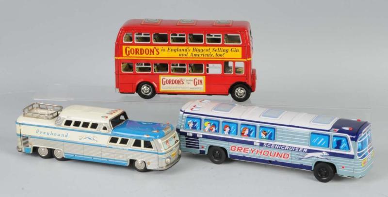 Appraisal: Lot of Tin Bus Friction Toys Description Japanese Working Two