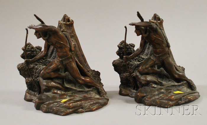 Appraisal: Pair of Patinated Copper American Indian Warrior Figural Group Bookends