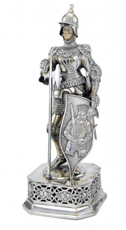 Appraisal: A CONTINENTAL SILVER AND IVORY STATUETTE OF A MEDIEVAL KNIGHT