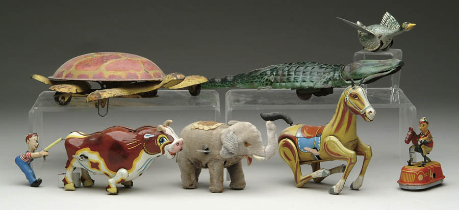 Appraisal: LOT OF SEVEN TOYS A German crocodile a Japanese horse