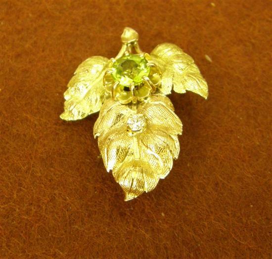 Appraisal: Peridot and diamond hallmarked ct gold leaf brooch