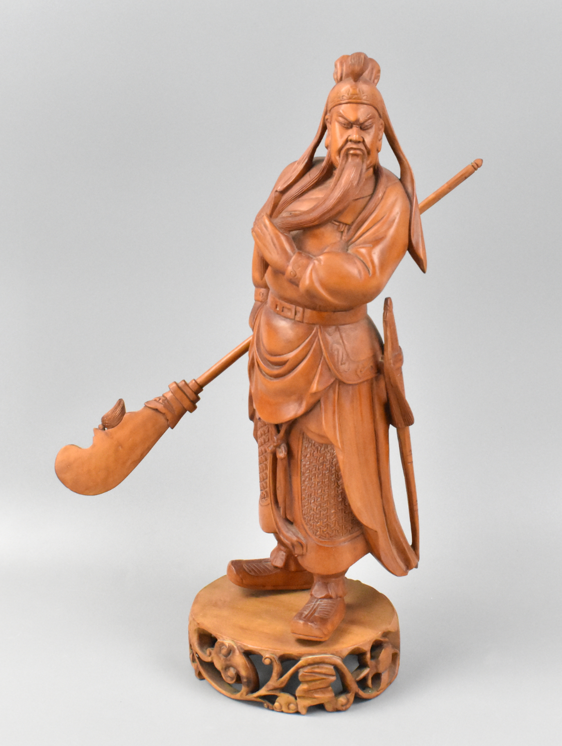 Appraisal: A carved wooden figure of a Guan Gong with weapon