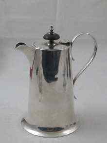 Appraisal: A small silver chocolate pot Walker Hall Sheffield cm high