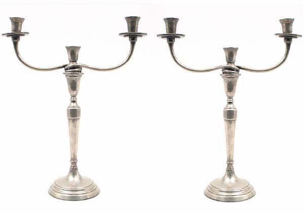 Appraisal: A Mexican sterling pair of two-arm three-light candelabra after the