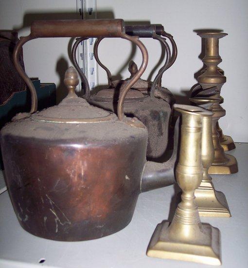 Appraisal: Three copper kettles and covers and sundry brass candlesticks