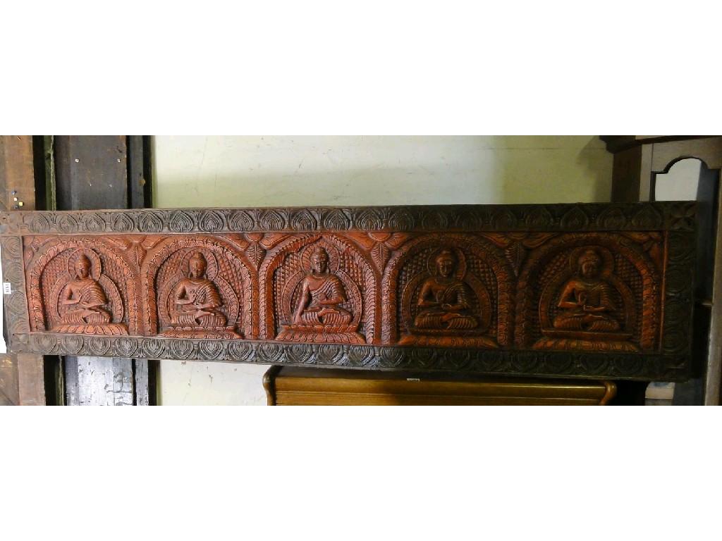 Appraisal: An Eastern panel of elongated rectangular form with carved deity