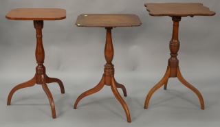 Appraisal: Three Federal cherry candlestands with shaped tops ht in in