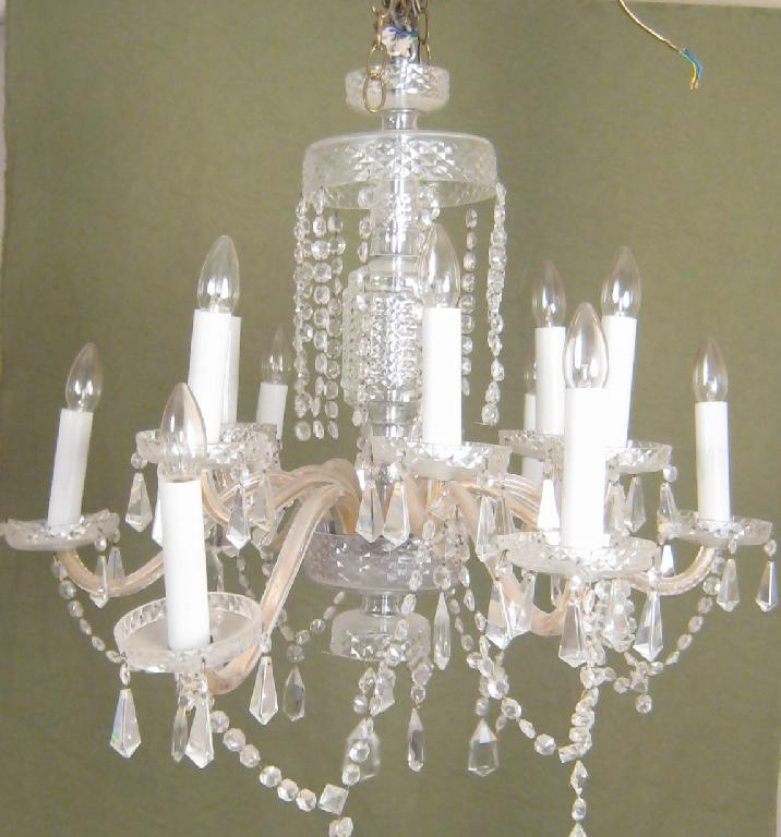 Appraisal: A large crystal twelve Branch Chandelier with scroll branches circular