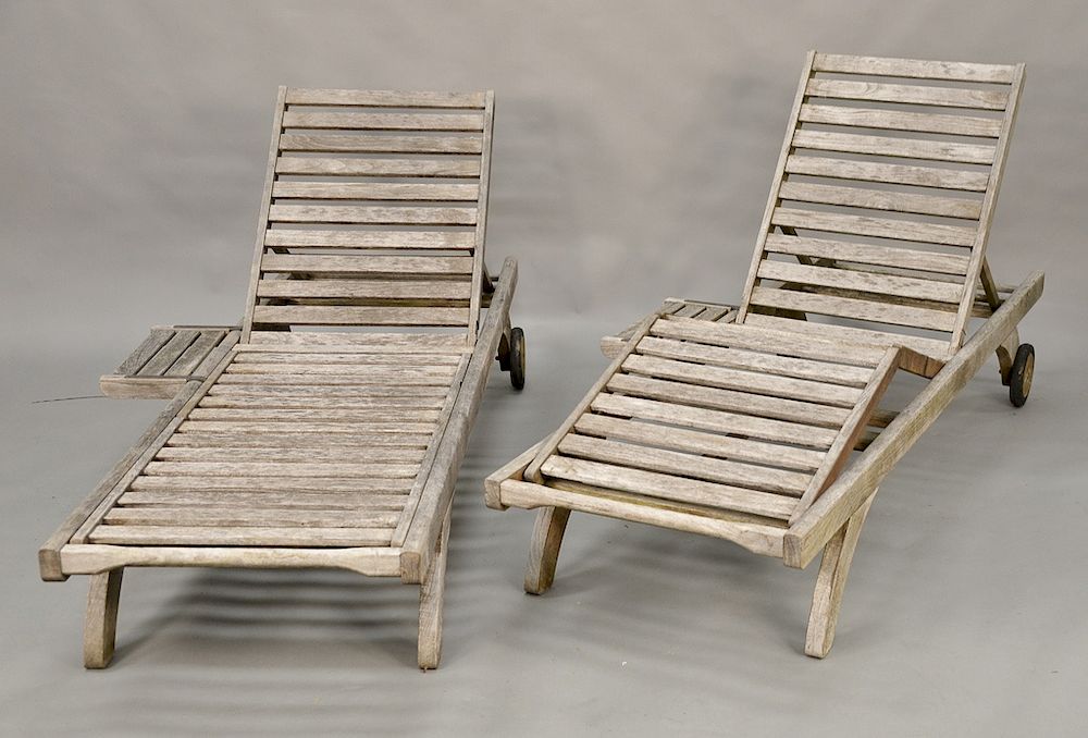 Appraisal: Pair of Barlow Tyrie teak outdoor chaise lounges lg in