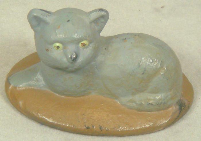 Appraisal: Cast iron doorstop small grey kitten on brown base tall